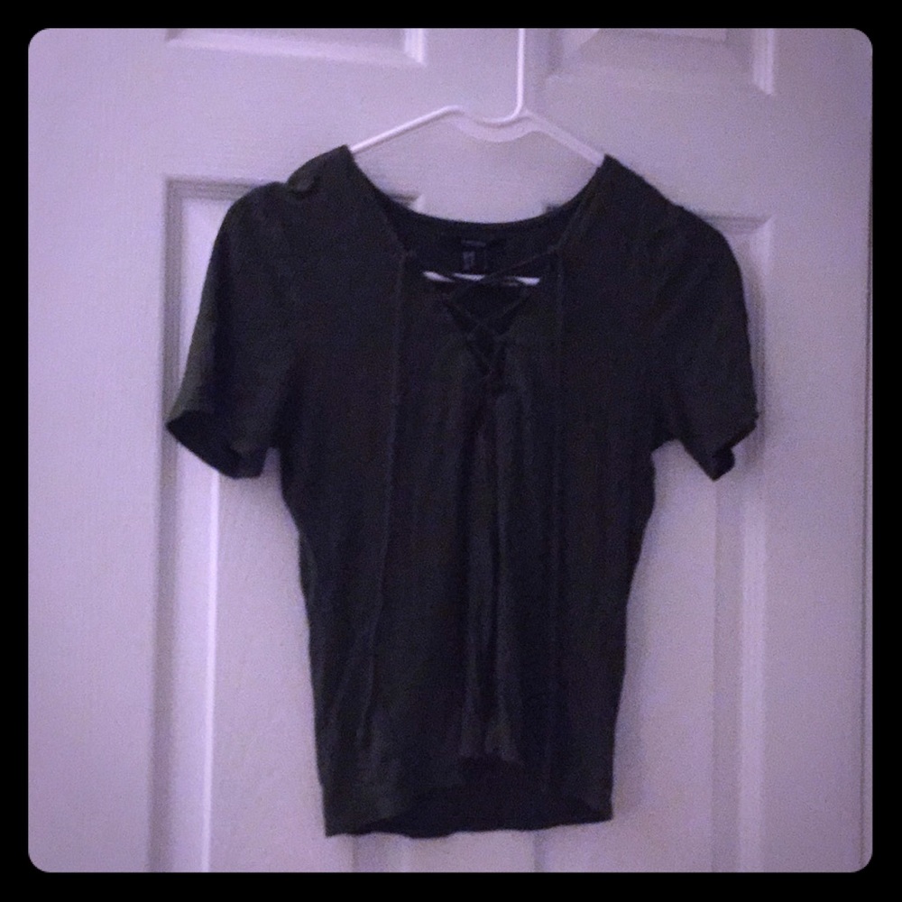 A dark green tee, with a cut down the middle.